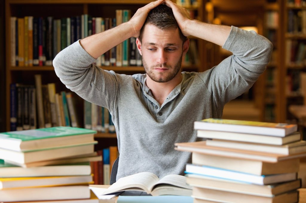 Student seeking dissertation methodology help in a UK university library