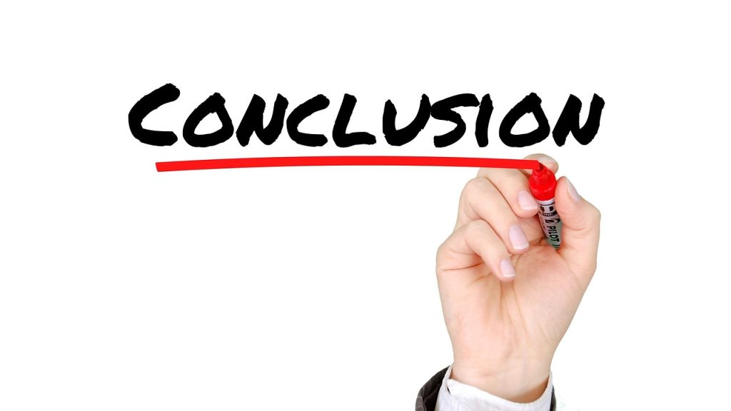 Dissertation conclusion help – hand underlining the word “Conclusion” in red